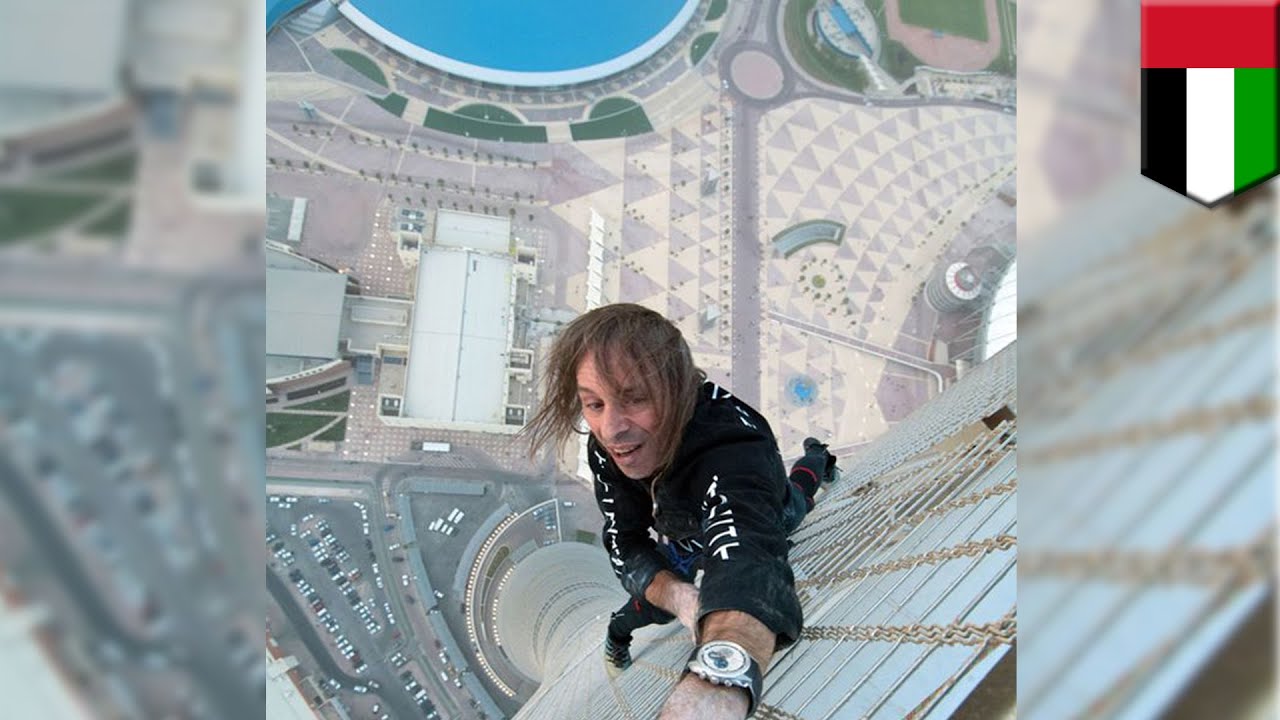 Alain Robert Scales Dubai's 1007ft Cayan Tower
